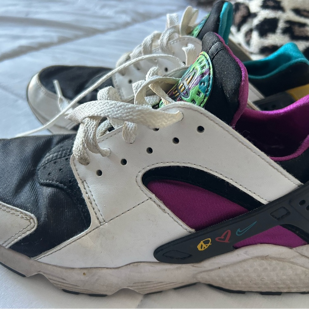 Nike Black and White Athletic Shoes with Purple Accents